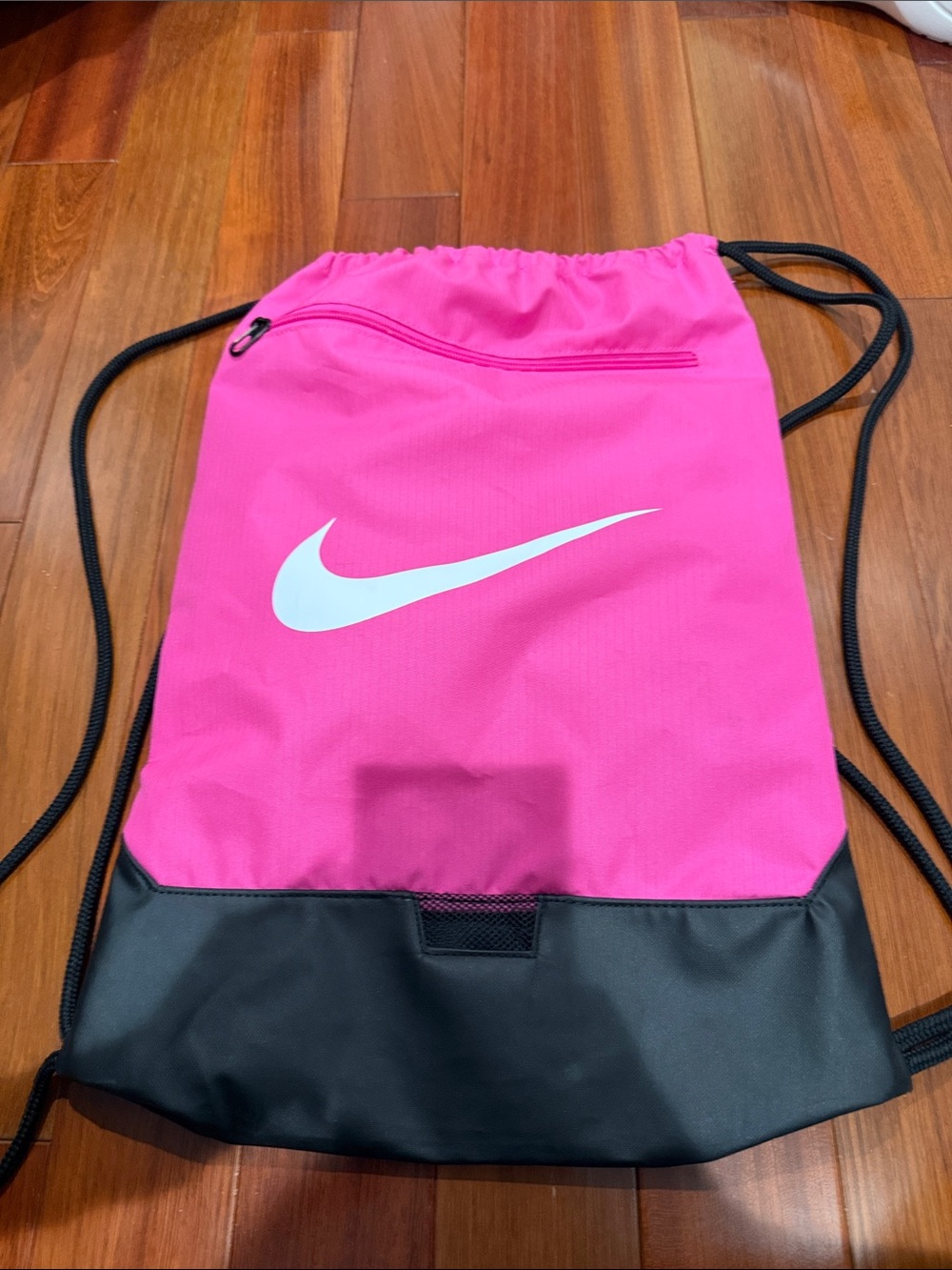 Nike Pink and Black Drawstring Backpack with White Swoosh
